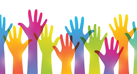 Colourful hands reaching upwards